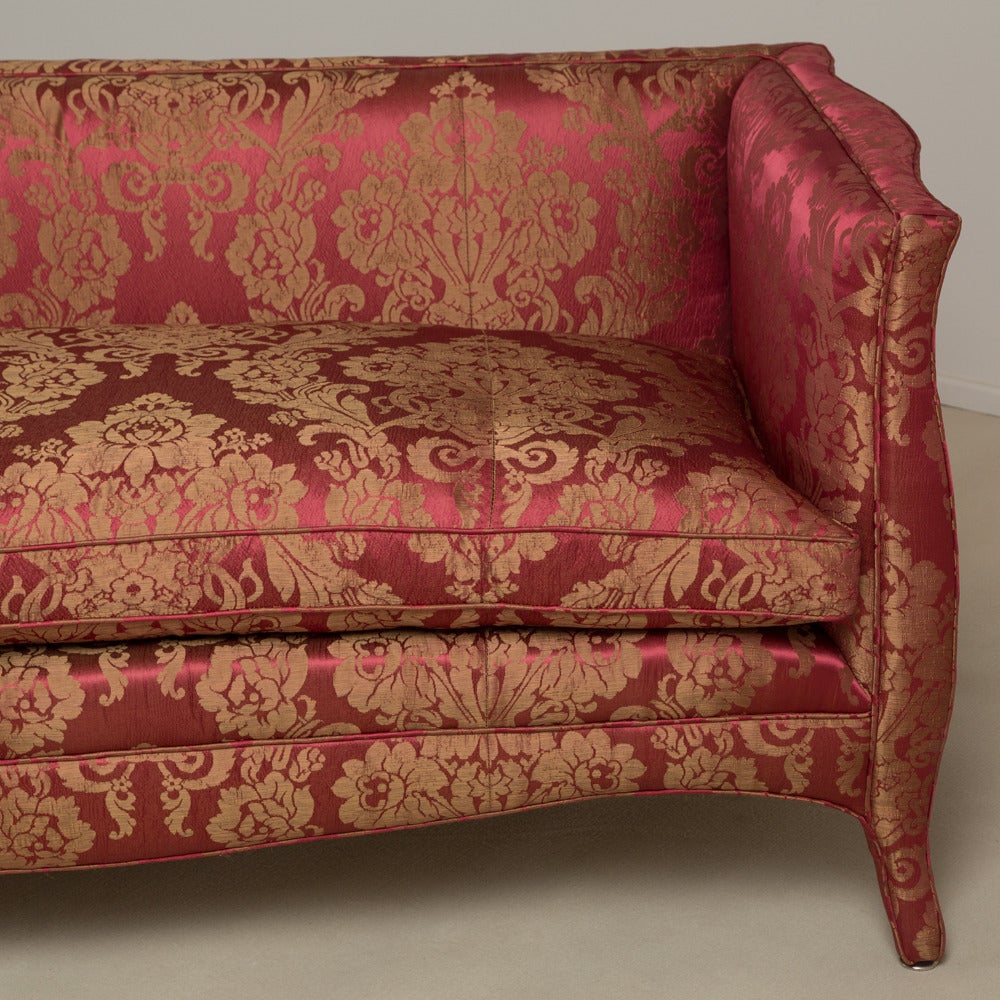 A standard high back French style silk damask upholstered sofa by Talisman Bespoke.

Unusual and elegant, this signature Talisman Bespoke sofa is inspired by a unique French 20th century design. 
