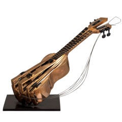 A Bronze Mandolin Table Sculpture by Arman