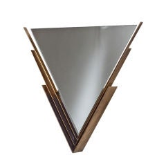 A Bronzed Metal Triangular Framed Mirror
