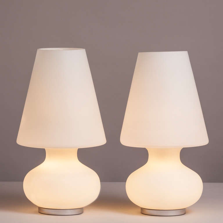 A pair of white frosted Murano glass table lamps set on nickel bases, 1970s.

NB: These items are subject to a further discount over and above the trade when exported outside the EU of 10%.