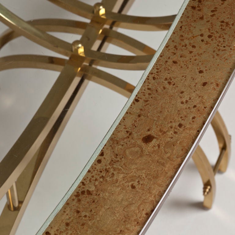An Oval Coffee Table on Brass Base & Gilded Glass Detailed Top