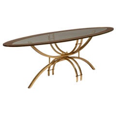 An Oval Coffee Table on Brass Base & Gilded Glass Detailed Top