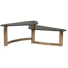 A Brass and Glass Asymetrical Two Tier Coffee Table