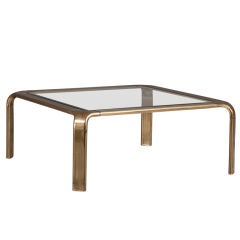 A Square Brass Coffee Table with Glass Top