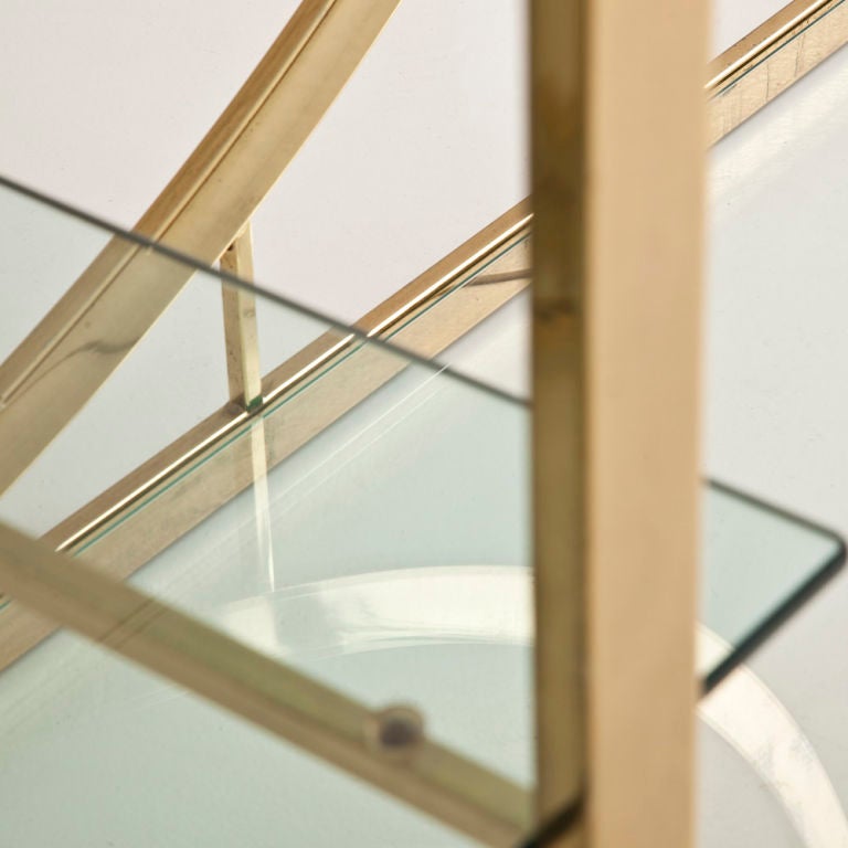 Late 20th Century A Pair of  D -Shaped Brassed Metal Etageres with Glass Shelves