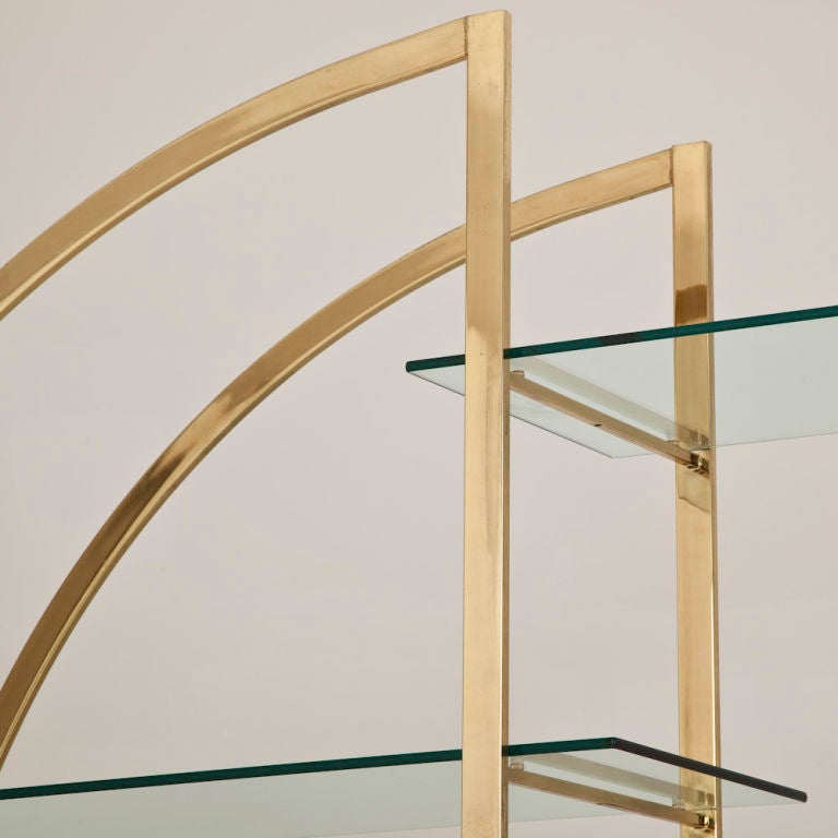 A Pair of  D -Shaped Brassed Metal Etageres with Glass Shelves 1