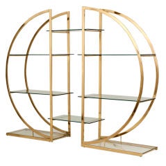 A Pair of  D -Shaped Brassed Metal Etageres with Glass Shelves