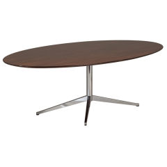 A Florence Knoll Designed Rosewood Oval Shaped Table