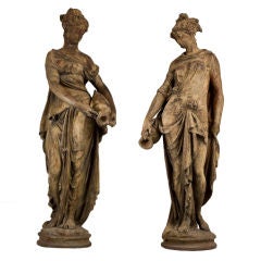 A Pair of Cast Iron Female Figures Stamped Durenne