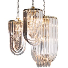 A Pair of 1980s Looped Lucite Chandeliers