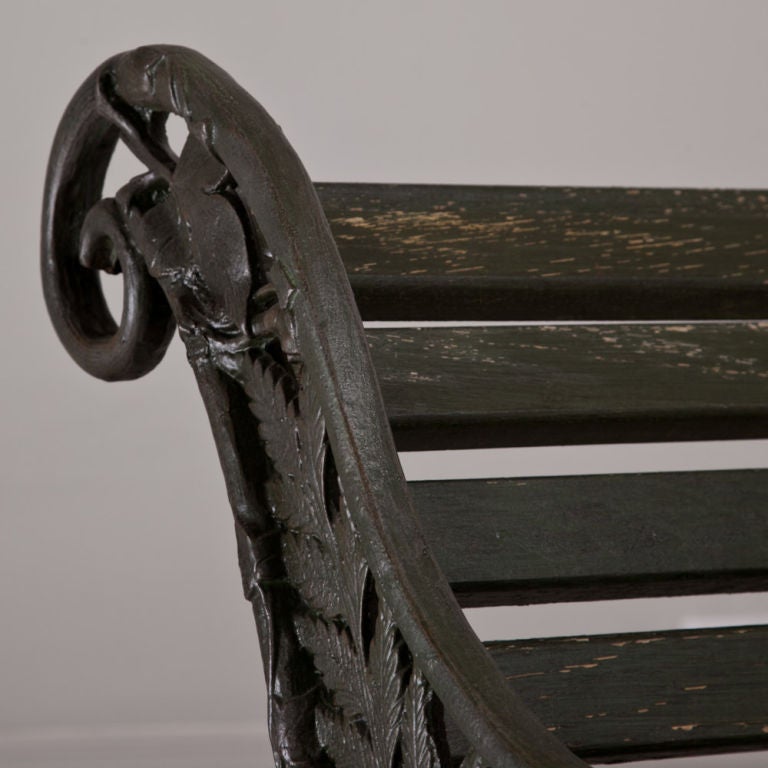 A Victorian Garden Bench with Cast Iron Ends in a Fern Pattern 1