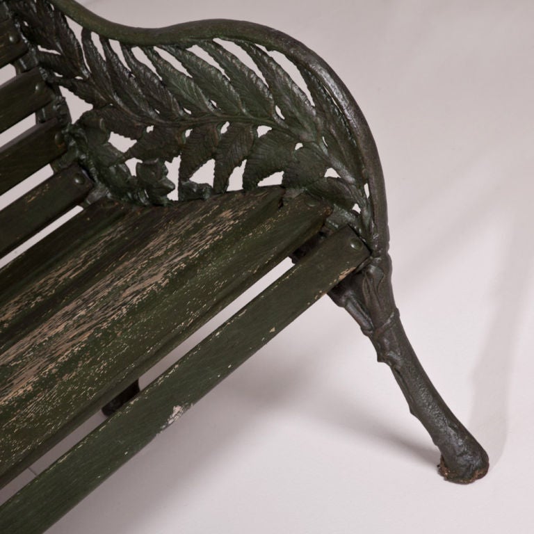 A Victorian Garden Bench with Cast Iron Ends in a Fern Pattern 2