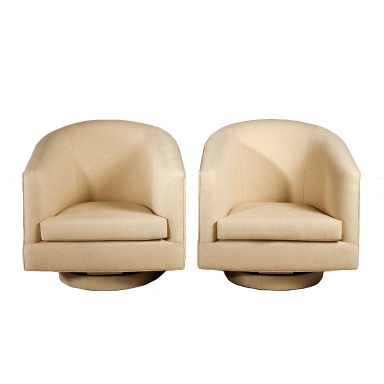 A Large Pair of Swivel Armchairs by Talisman Upholstered in Yellow Fabric<br />
Seat Height:17