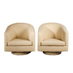 A Large Pair of Swivel Armchairs by Talisman