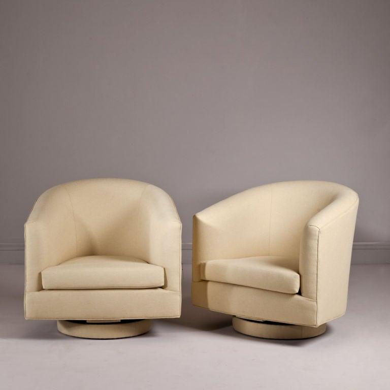 British A Large Pair of Swivel Armchairs by Talisman