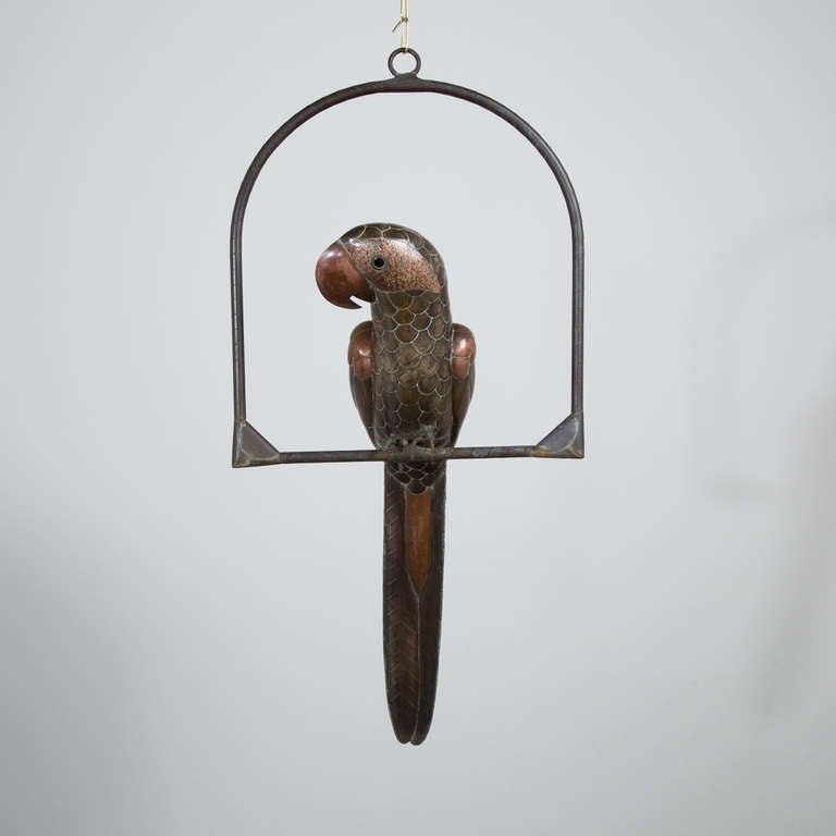 A Tarnished Brass Long Tail Parrot on an Arch Stand by Sergio Bustamante 1960s