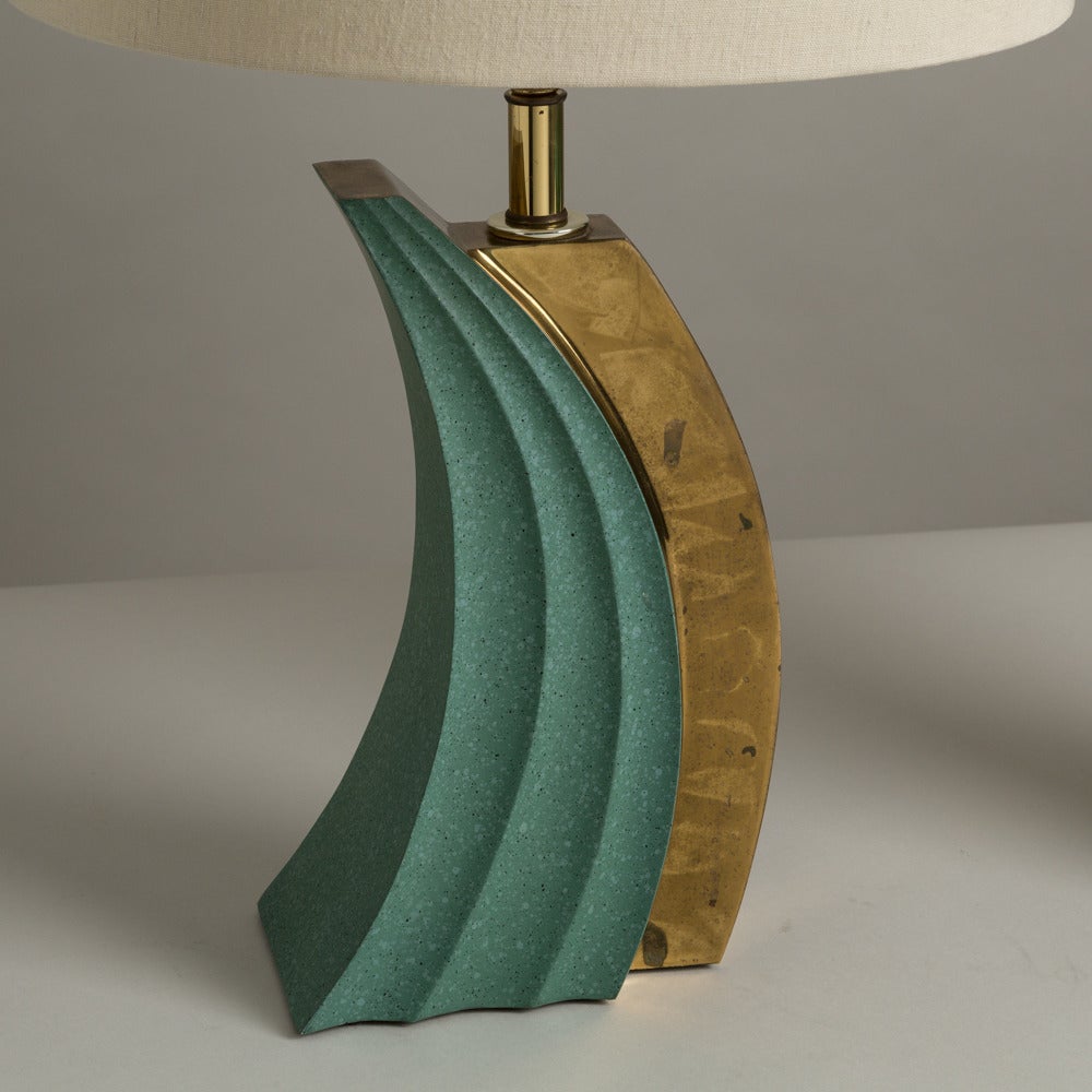 A pair of green ceramic and bronze wave shaped table lamps, 1960s.