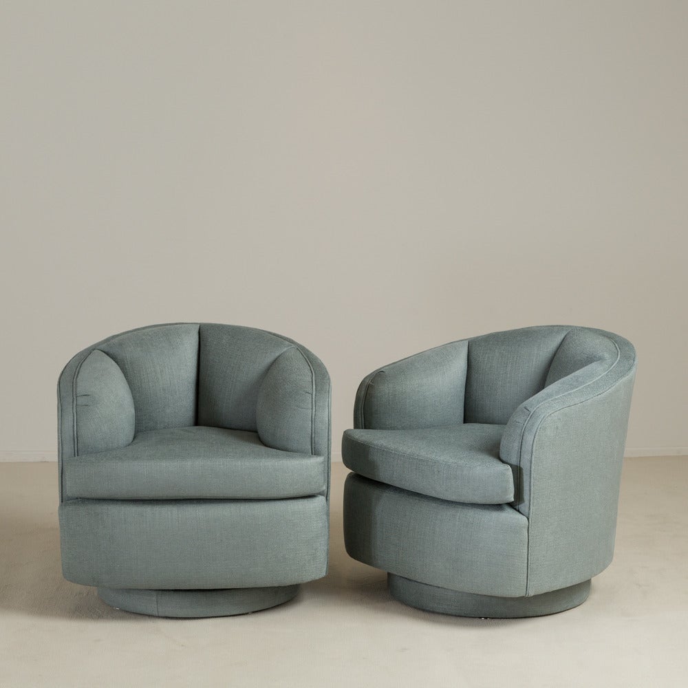A Pair of Quilted Upholstered Swivel Armchairs 1970s

Entirely rebuilt and reupholstered by Talisman
