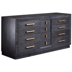 A Cerused Oak 12 Drawer Buffet with Bronze Handles