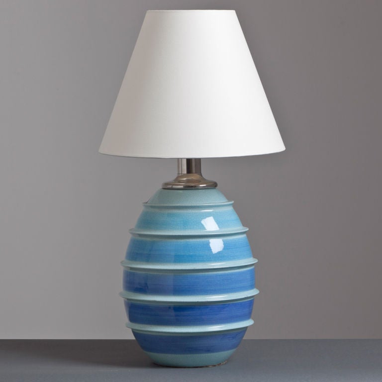 Single Italian ceramic and nickel plated ringed lamp in blues and duck egg tones accompanied with a cream shade, 1960s.