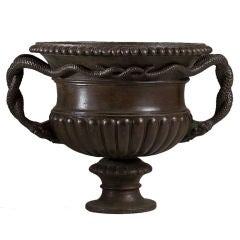 A Late 19th Century Warwick Style Cast Iron Urn
