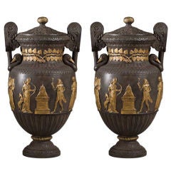 A Pair of Neo Classical Cast Iron Urns