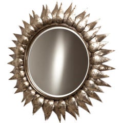 A Contemporary Beaten Metal Sunburst Mirror