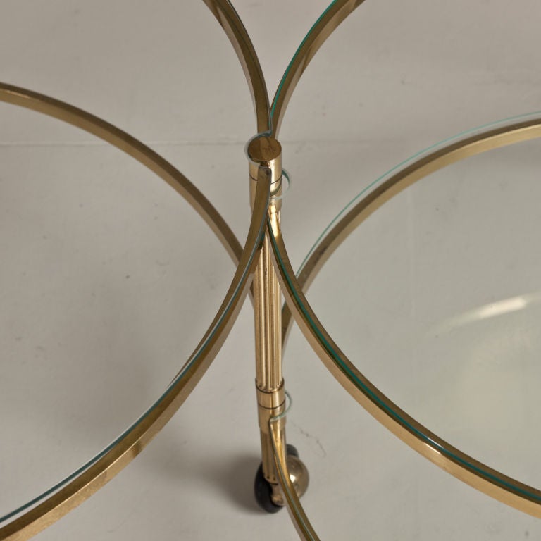 Late 20th Century A Two Tiered, Brass Framed Swivel Extending Coffee Table