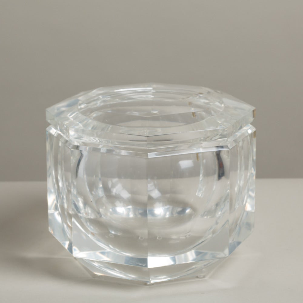 A Hexagonal Lucite Ice Bucket with Swivel Top 1970s

Prices include 20% VAT which is removed for items shipped outside the EU.