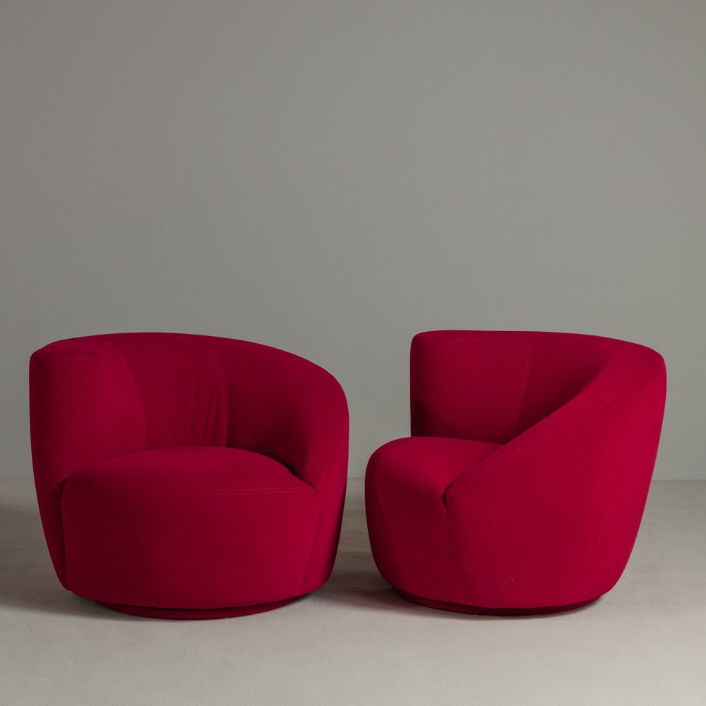 A Pair of Vladimir Kagan designed Nautilus Swivel Chairs 1980s, original upholstery in excellent vintage condition