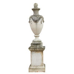 A Large Composition Finial Urn on Pedestal