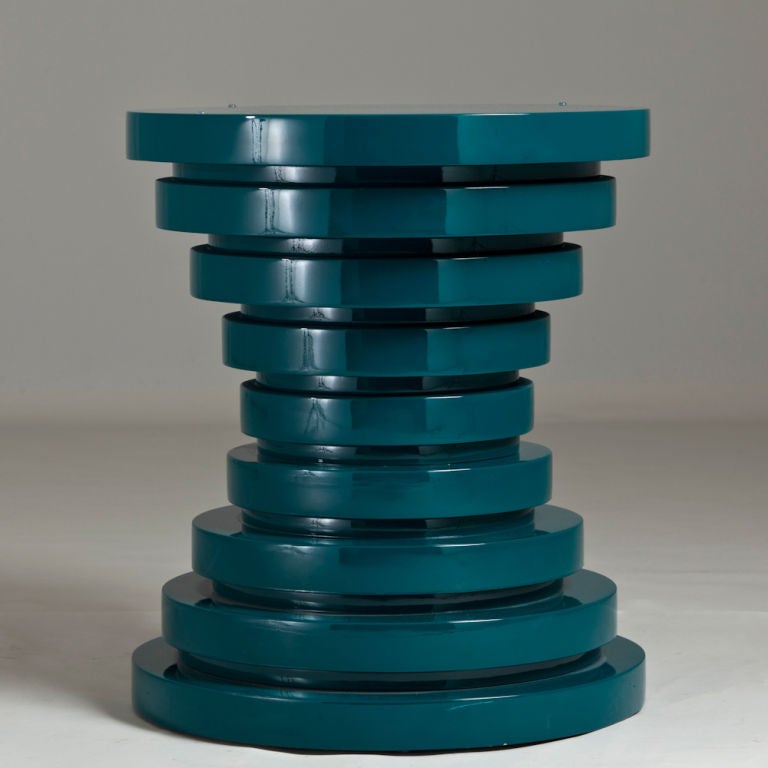 A Turquoise Lacquered Centre Table with a Drum Shaped Table Base and Glass Top