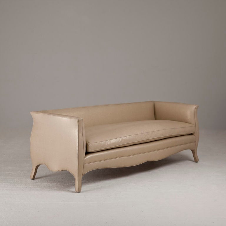 A Standard Highback French Style Gold Lame Upholstered Sofa by Talisman Bespoke. Unusual and elegant, this signature Talisman Bespoke sofa is inspired by a unique French 20th century design.  This sofa is available in a variety of fabrics and can be