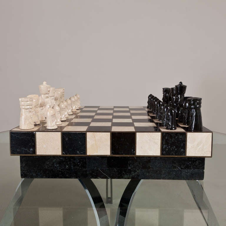 A Superb Maitland Smith designed Ebony and Ivory Stone Veneered Chess Set 1970s the Board doubling up as a Box for the Carved Pieces to be stored in when not in use