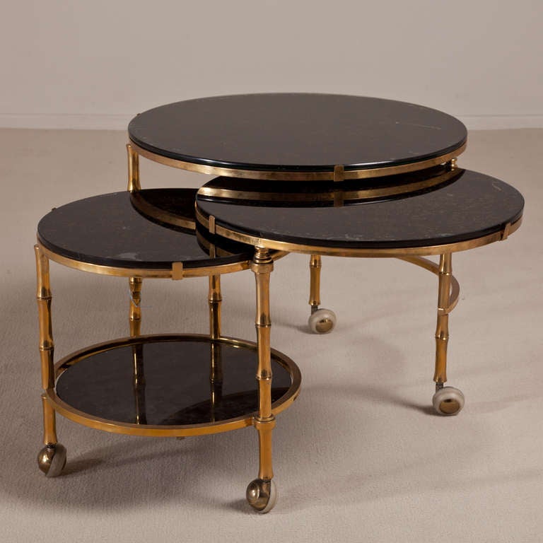A Three Tiered Brass and Eglomise Swivel Side Table 1960s