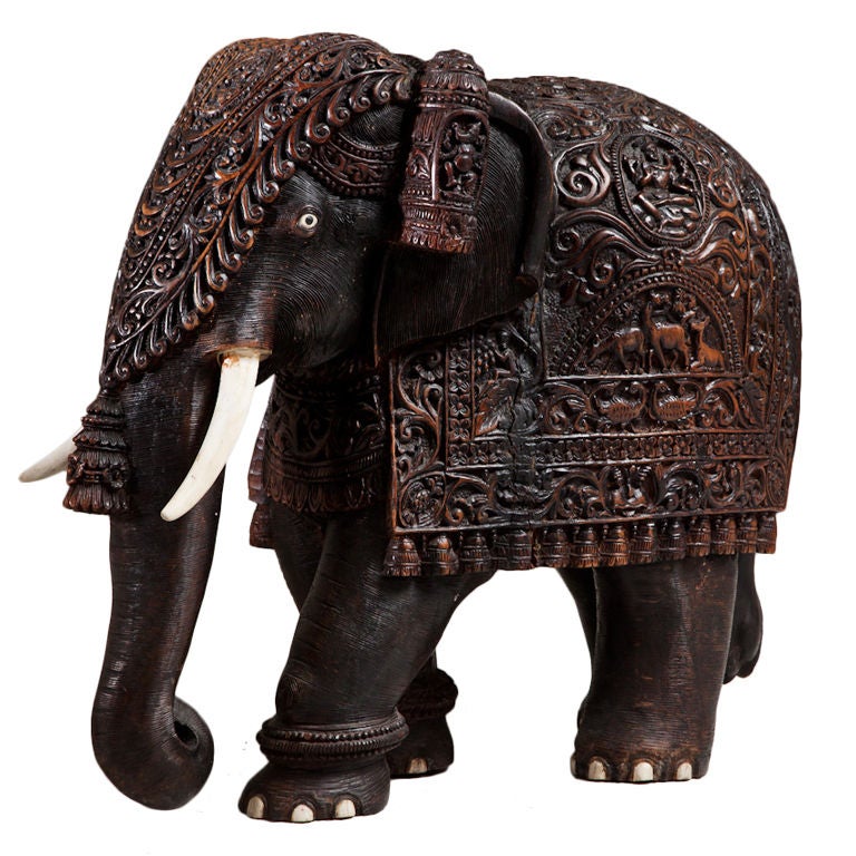 A Mid 19th Century Teak Indian Elephant With Carved Bone Tusks
