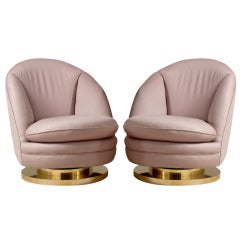 A Pair of Milo Baughman Swivel and Tilting Armchairs 1970s