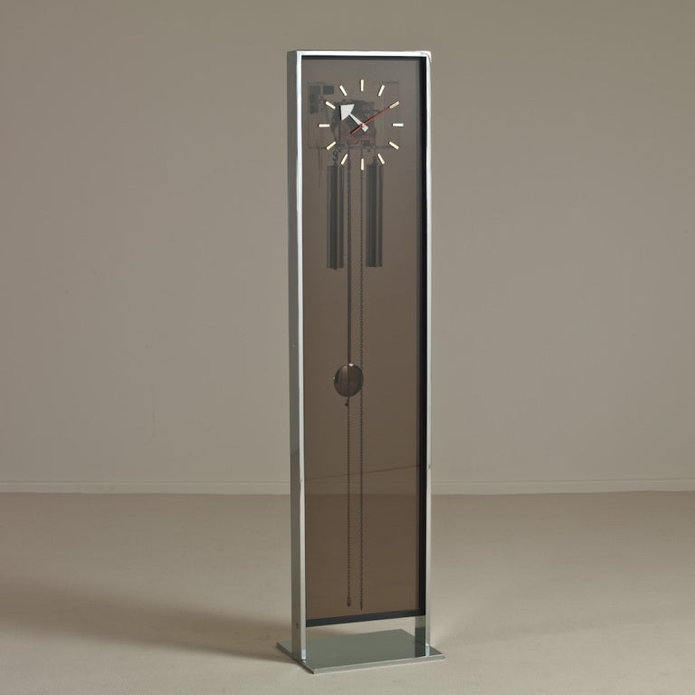 A Chromium Steel and Smoked Lucite Faced Floor Standing Clock by Howard Miller 1970s