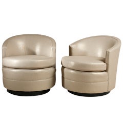 A Pair of Upholstered Occasional Swivel Chairs 1970s