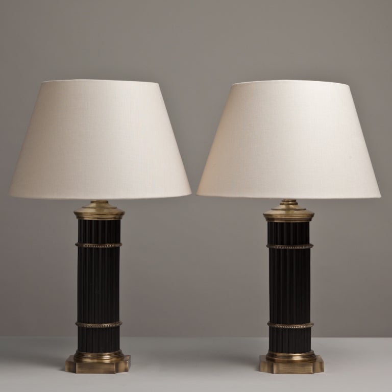 A Pair of Ribbed Black and Brass metal Table Lamps 1960s