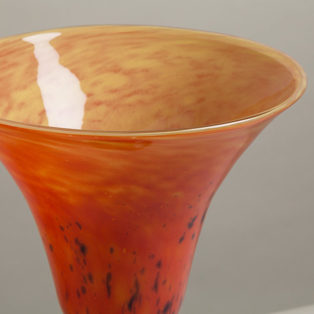 A sensational large fluted glass vase in burnt orange and yellow tones by Schneider, France, 1930s signed

Schneider Glass was a French company founded by brothers Ernest and Charles Schneider in 1917.  They introduced many deco textures, colours
