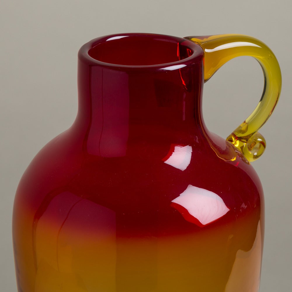 A large amberina blown glass jug with handle in the manner of Blenko, 1960s.
