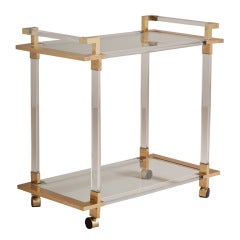 A Large Brass and Lucite Framed Two Tiered Barcart 1970s A Large Brass and Lucite Framed Two Tiered Barcart 1970s
