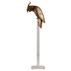 A Sergio Bustamante Brass Cockatoo on a Lucite Stand 1970s