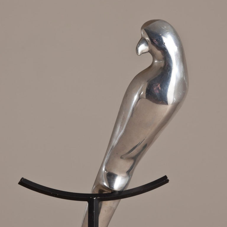A tall aluminium bird floor sculpture attributed to Curtis Jere set on a newly polished aluminium stand with a thick cylindrical base, 1970s.

Please note the stand is inaccurate in all images as it is now aluminium and not black.

Curtis Jeré
