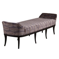 A Hollywood Regency Style Upholstered Bench on Ebonised Frame