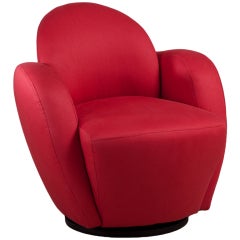 A Directional Swivel Armchair Upholstered by Talisman