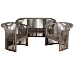 A Teak Curved Two Seater Bench