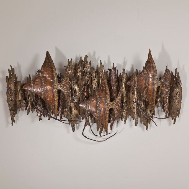 A Metal Wall Sculpture depicting a Shoal of Angel Fish 1970s