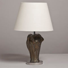 A Single Sculptural Table Lamp depicting a Group of Elephants A Single Sculptural Table Lamp depicting a Group of Elephants